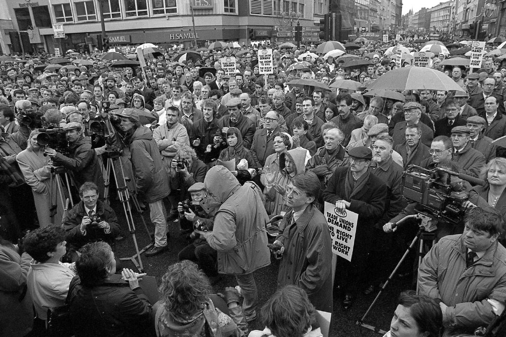 An anti-violence demonstration from 1993 in Belfast city centre. Photograph by Kevin Cooper the project explores the importance of civil society to the Northern Ireland peace process