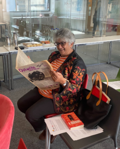 Shaila-Shah (Outwrite) reading Outwrite (a UK feminist magazine from the 1980s) at the Activist Legacies Roundtable 1