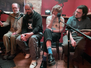 Richard O'Brien interviews local songwriters Nev Clay and NOVYI LEF band members Thomas Reah and Euan Lynn - photo by Jenny Alderson
