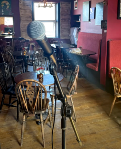 A microphone ready to go for performers at 'Songwriters in Conversation #2'. April 2025